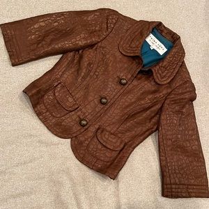 Stunning Trina Turk quarter sleeve blazer.